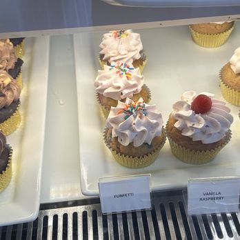 Frost Me Cafe & Bakery - Selecting out cupcakes - Coffee & Tea Near Me - San Diego, California