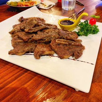 Cafe Wang - 17. BBQ Angus Beef Short Rib 3/5. Great presentation! Wish it's more tender. - Dim Sum Near Me - La Verne, California Cafe Wang - 17. BBQ Angus Beef Short Rib 3/5. Great presentation! Wish it's more tender. - Dim Sum Near Me - La Verne, California