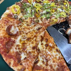 Gino's Pizza & Spaghetti House - Half pepperoni and half supreme