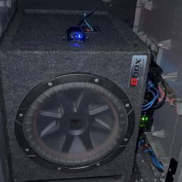 Subwoofer, and amp installed in my big rig. Subwoofer, and amp installed in my big rig.