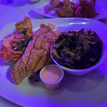 Coasis Restaurant & Bar - Seafood platter with a side of greens. - New American Near Me - Tampa, Florida Coasis Restaurant & Bar - Seafood platter with a side of greens. - New American Near Me - Tampa, Florida