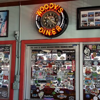 Woody's Diner - a clock on the wall - Diners Near Me - Sunset Beach, California