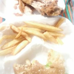 Burger, fries and fried Turkey wing.