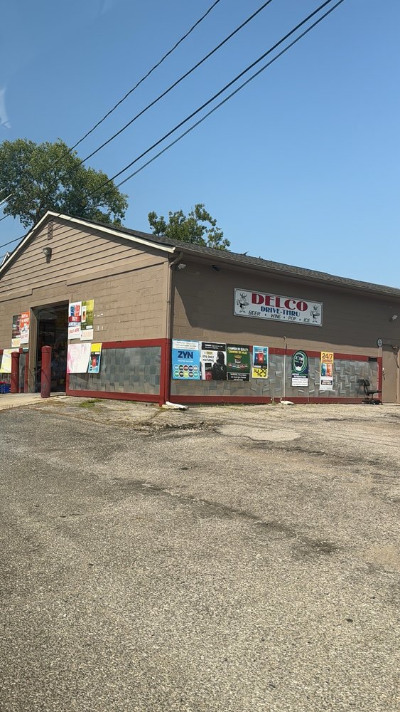 Del-Co Drive Thru's Logo
