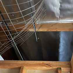 StorCal Self Storage - Woodland Hills #3 - The wire mesh above my storage unit was ripped wide open. This is where and how the thief gained access to my unit.