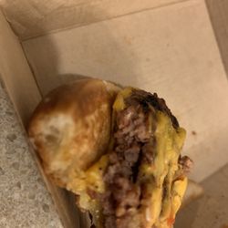 McDonald's - Tore this Q-pounder so you can see how raw it is. We wont be back.