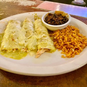 Uncle Julio's - Pollo enchiladas verde, black beans and rice - Tex-Mex Near Me - Arlington, Virginia Uncle Julio's - Pollo enchiladas verde, black beans and rice - Tex-Mex Near Me - Arlington, Virginia
