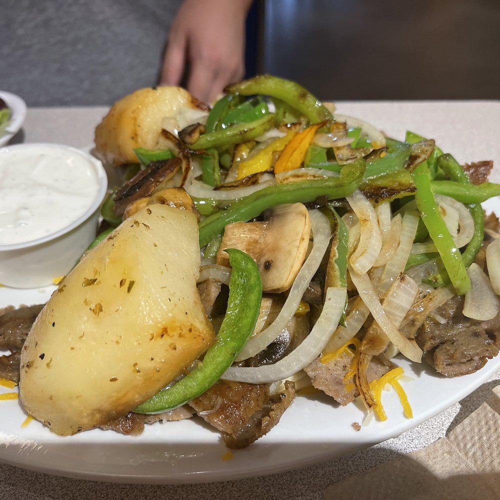 Feta's Gyros - Chicken Gyro Supreme. I think that is what it was. - Greek Near Me - Omaha, Nebraska Feta's Gyros - Chicken Gyro Supreme. I think that is what it was. - Greek Near Me - Omaha, Nebraska