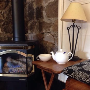 Potion Tea & Bakery - Tea time in front of the fire - Tea Rooms Near Me - Flagstaff, Arizona