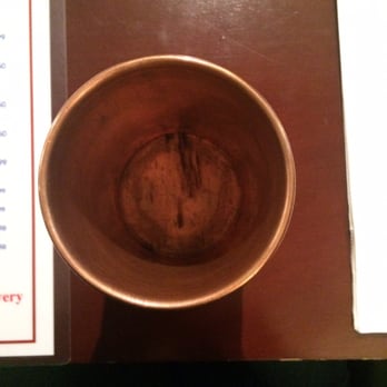 Kothur Indian Cuisine - The copper cup! Don't be alarmed if it looks like this, copper vessels are great. There's just a little wear and tear on some of these. - Indian Near Me - Toronto, Ontario Kothur Indian Cuisine - The copper cup! Don't be alarmed if it looks like this, copper vessels are great. There's just a little wear and tear on some of these. - Indian Near Me - Toronto, Ontario