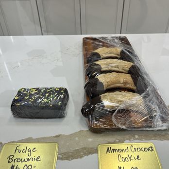 Zoe's Bakery - Fudge brownie and almond crescent cookie - Bakeries Near Me - New Orleans, Louisiana Zoe's Bakery - Fudge brownie and almond crescent cookie - Bakeries Near Me - New Orleans, Louisiana