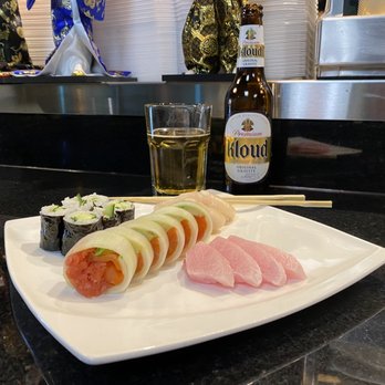 Tokyo Sushi - Cucumber roll, spicy tuna roll with cucumber wrap, hamachi toro sashimi, Hokkaido scallop nigiri, and an ice cold Kloud beer. - Japanese Near Me - Folsom, California Tokyo Sushi - Cucumber roll, spicy tuna roll with cucumber wrap, hamachi toro sashimi, Hokkaido scallop nigiri, and an ice cold Kloud beer. - Japanese Near Me - Folsom, California