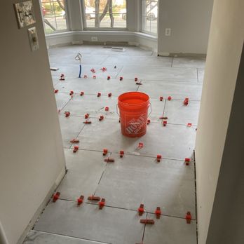Mosaic - Carrara marble threshold transition piece installed. - Kitchen & Bath Near Me - Alexandria, Virginia