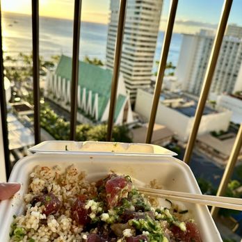 Off the Hook Poke Market - Enjoying Off the Hook Poke bowl with beautiful view of Waikiki beach during sunset - Poke Near Me - Honolulu, Hawaii Off the Hook Poke Market - Enjoying Off the Hook Poke bowl with beautiful view of Waikiki beach during sunset - Poke Near Me - Honolulu, Hawaii
