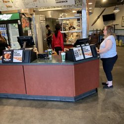 Wingstop - Ten people making wings.