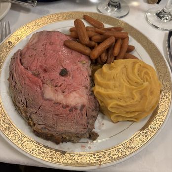 The Hilltop Restaurant - Prime Rib, medium rare, glazed carrots, and sweet potato/mashed potato mix. - American Near Me - Orange Park, Florida The Hilltop Restaurant - Prime Rib, medium rare, glazed carrots, and sweet potato/mashed potato mix. - American Near Me - Orange Park, Florida