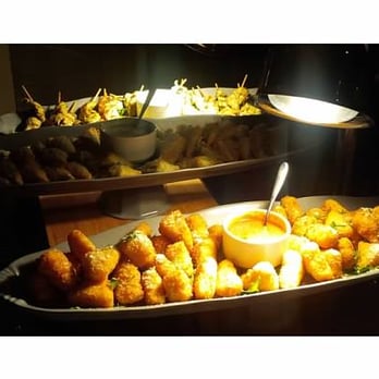 Pinstripes - Fried Mac & Cheese (front), Feta & Spinach Stuffed Phyllo (center), and Pesto Chicken Skewers (back) - Venues & Event Spaces Near Me - Washington, DC, District of Columbia Pinstripes - Fried Mac & Cheese (front), Feta & Spinach Stuffed Phyllo (center), and Pesto Chicken Skewers (back) - Venues & Event Spaces Near Me - Washington, DC, District of Columbia