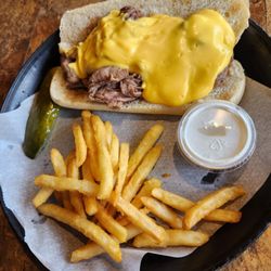 Fokker's Bar & Grille - Beef and cheddar, fries pickle and side horseradish.