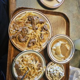 Beef stroganoff, mash potatoes, macaroni salad
