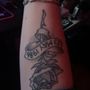 Photo of Tiki Tattoo