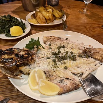 Estia - Whole white snapper, greens and roasted potatoes. - Cocktail Bars Near Me - Radnor, Pennsylvania Estia - Whole white snapper, greens and roasted potatoes. - Cocktail Bars Near Me - Radnor, Pennsylvania