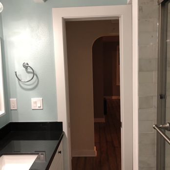 NW Quality Construction - Pocket door!  We have a very small bathroom, it has SO MUCH storage + room now. :) - General Contractors Near Me