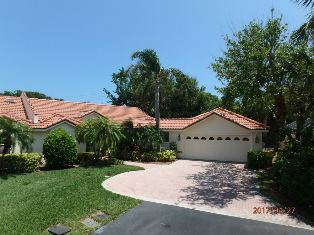 Slide of Orchid Island Roofing