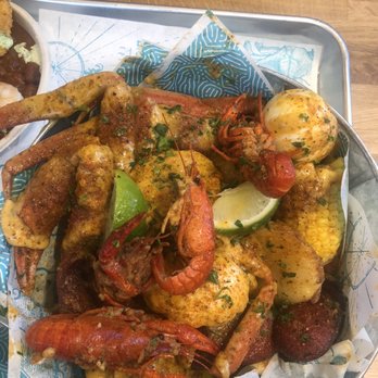 Mr. Shrimp Cajun Kitchen - Crab leg boil (2 large crabs) added hard boiled eggs and andouille sausage. I had leftover crawfish and put it in there. - Cajun/Creole Near Me - Pompano Beach, Florida