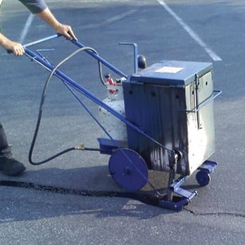 Primex Paving - a man using a machine - General Contractors Near Me - Vaughan, Ontario Primex Paving - a man using a machine - General Contractors Near Me - Vaughan, Ontario