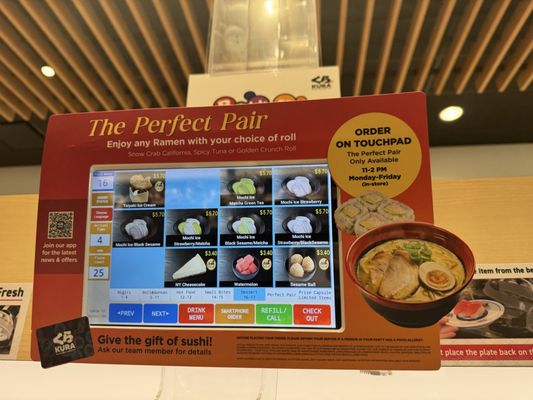 Kura Revolving Sushi Bar by null