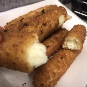 Benzina's Bistro - Rock hand cheese stick , cheese wasn't stringy - Pizza Near Me - Belleville, Michigan Benzina's Bistro - Rock hand cheese stick , cheese wasn't stringy - Pizza Near Me - Belleville, Michigan