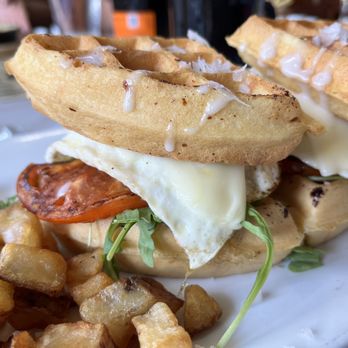Le Café Station Grill - Coconut waffle sandwich - Breakfast & Brunch Near Me - Chicago, Illinois Le Café Station Grill - Coconut waffle sandwich - Breakfast & Brunch Near Me - Chicago, Illinois