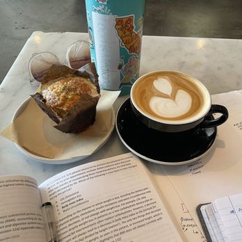 Romancing the Bean Cafe - Soy latte and vegan lemon glazed muffin. The muffin was a bit too sweet, but happy to see vegan options. - Coffee & Tea Near Me - Burbank, California Romancing the Bean Cafe - Soy latte and vegan lemon glazed muffin. The muffin was a bit too sweet, but happy to see vegan options. - Coffee & Tea Near Me - Burbank, California