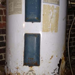 Dellinger Plumbing - This was one of the worst water heaters I've seen in a while, it was about to fall apart.