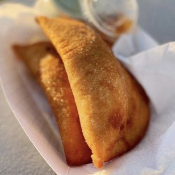 Two Empanadas - a close up of a food item - Empanadas Near Me - Memphis, Tennessee Two Empanadas - a close up of a food item - Empanadas Near Me - Memphis, Tennessee