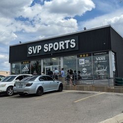 SVP Sports - Cartwright - From the west side of the parking lot looking at the storefront and front entrance (where people are going in). July 2022