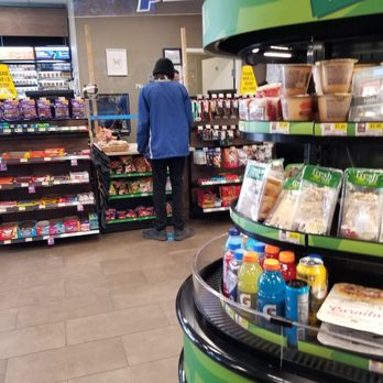ampm - a man in a grocery store - Convenience Stores Near Me - Bakersfield, California