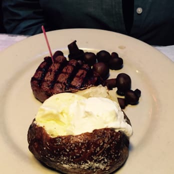Manny's Original Chophouse - Filet Mignon with mushrooms and a baked potato. - Steakhouses Near Me - Winter Haven, Florida Manny's Original Chophouse - Filet Mignon with mushrooms and a baked potato. - Steakhouses Near Me - Winter Haven, Florida