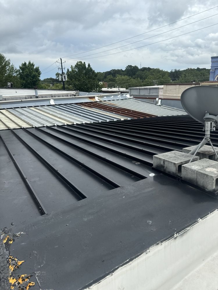 Slide of Mosaic Roofing Company