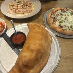 Supreme Calzone, 10" Pizza, Chicken Alfredo, bruschetta and fried zucchini. Supreme Calzone, 10" Pizza, Chicken Alfredo, bruschetta and fried zucchini.
