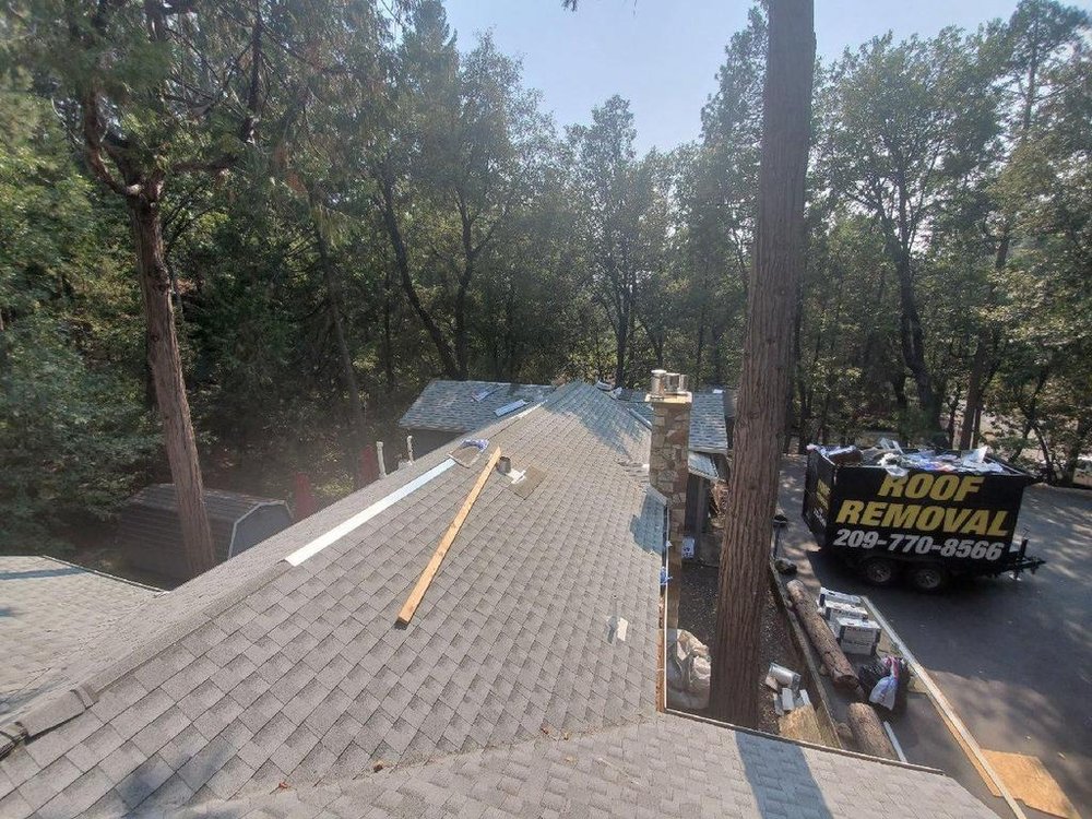 Slide of Warren Roofing