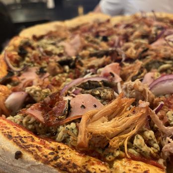 Black Rock Pizza - Interesting texture vegan cheese: it's the pieces that look like sausage. - Pizza Near Me - Kihei, Hawaii Black Rock Pizza - Interesting texture vegan cheese: it's the pieces that look like sausage. - Pizza Near Me - Kihei, Hawaii