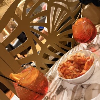 Avianca Lounge - Aperol spritz with side ñoquis - Airport Lounges Near Me - Miami, Florida Avianca Lounge - Aperol spritz with side ñoquis - Airport Lounges Near Me - Miami, Florida