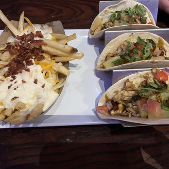Brick's Bar & Grill - Teriyaki chicken tacos with bacon cheese fries - Burgers Near Me - Cedar Rapids, Iowa