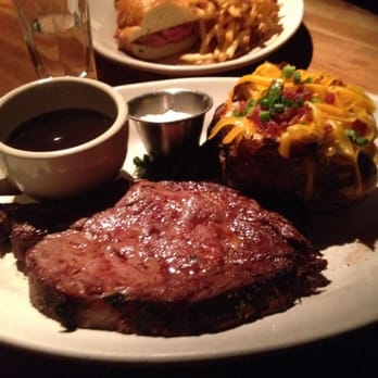 Houston's Restaurant - Prime rib with loaded baked potato - New American Near Me - Irvine, California Houston's Restaurant - Prime rib with loaded baked potato - New American Near Me - Irvine, California