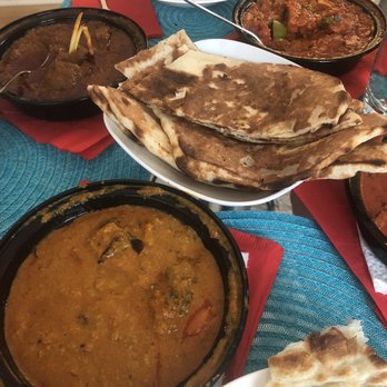 The Bombay - Four curries for takeout. - Indian Near Me - Toronto, Ontario