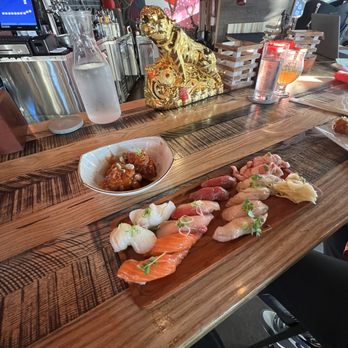 Iza Whiskey & Eats - Stocked bar with all the brown water you can imagine! - Sushi Bars Near Me - Carrboro, North Carolina