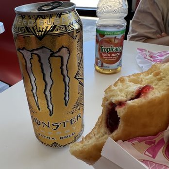 Top Donuts - a half eaten donut and a can of energy drink - Donuts Near Me - Magnolia, Texas Top Donuts - a half eaten donut and a can of energy drink - Donuts Near Me - Magnolia, Texas