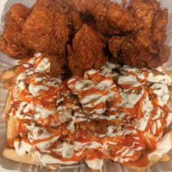 Rocki's Chicken - 10 Boneless wing combo tossed in buffalo with buffalo loaded fries