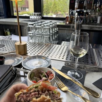 Olinda - Hamburger, feta/tomato salad, Ciao Bella white wine, bar area, pretty outdoor dining area (too cold this afternoon) - New American Near Me - Canton, Ohio